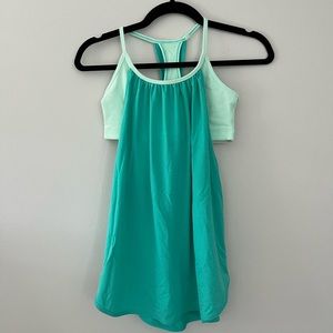 Lululemon size 4 mint green loose tank with built in bra